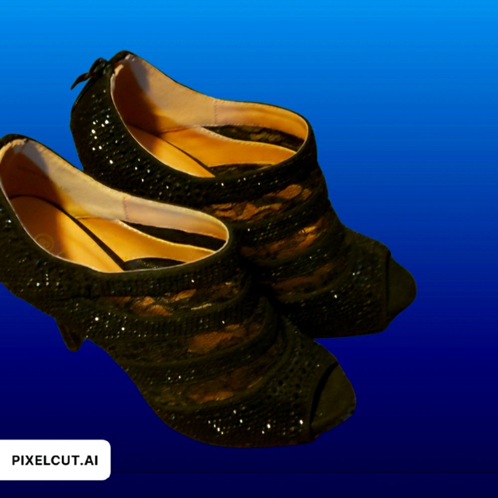 coach and four black lace shoes